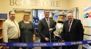Attending the ribbon cutting for the renovated WSU bookstore are (from left) Sean Cook, bookstore manager; Julie Kazarian, dean of students; President Maloney; and David Klein of Follett.