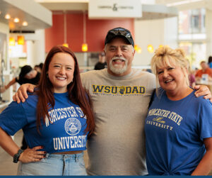 Female WSU students and her parents at Family Day