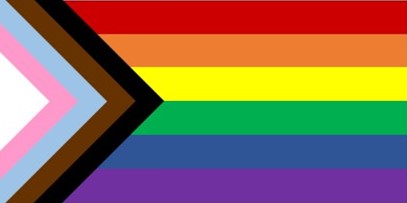 The new pride flag: horizontal bars of red, orange, yellow, green, blue, and purple and diagonal bars of white, pink, baby blue, brown, and black