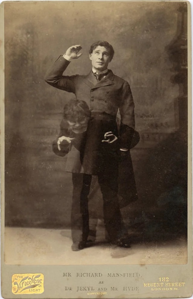 A double exposed photograph of a man in a suit standing straight and a werewolf-like creature hunched menacingly in the same spot