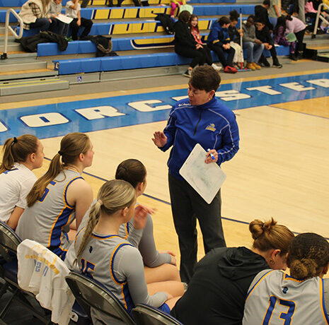 WSU Coach Karen Tessmer instructs the team
