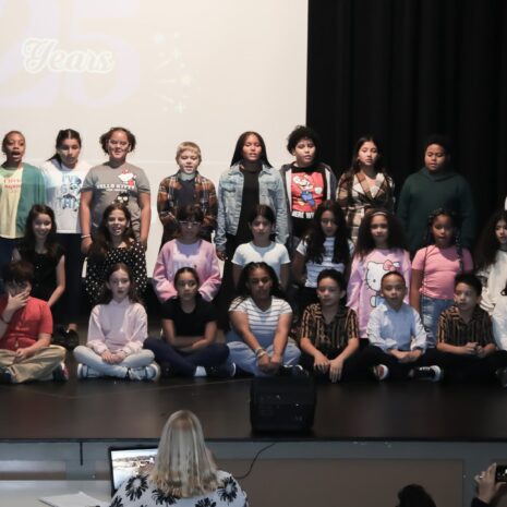 The Chandler Magnet/La Familia School Choir on stage at the event