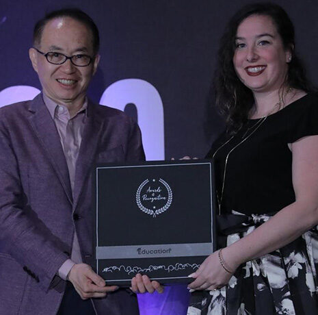 Stephanie Teixeira receives her award at the Education 2.0 Conference