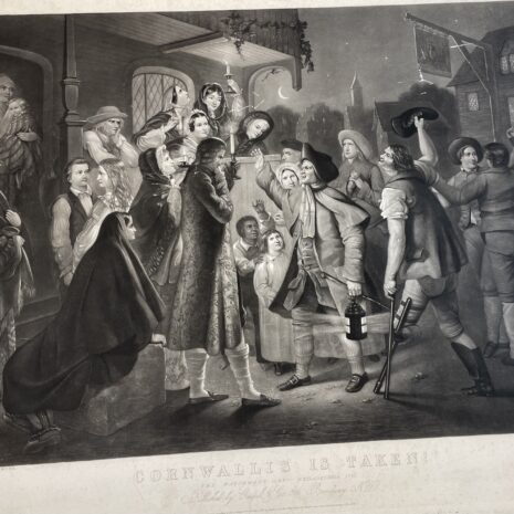 A group of people gathered at night in front of a house