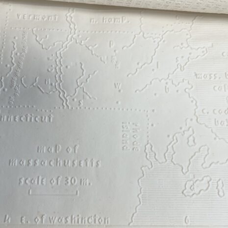 The outlines of Massachusetts are raised