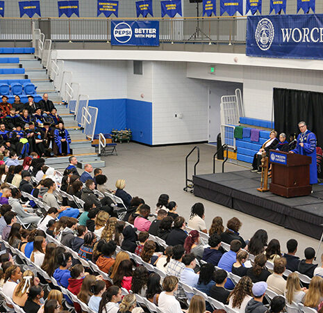 President Maloney at the podium at Convocation