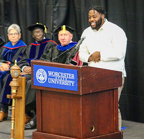 Keynote speaker Dejour Hollins at the podium